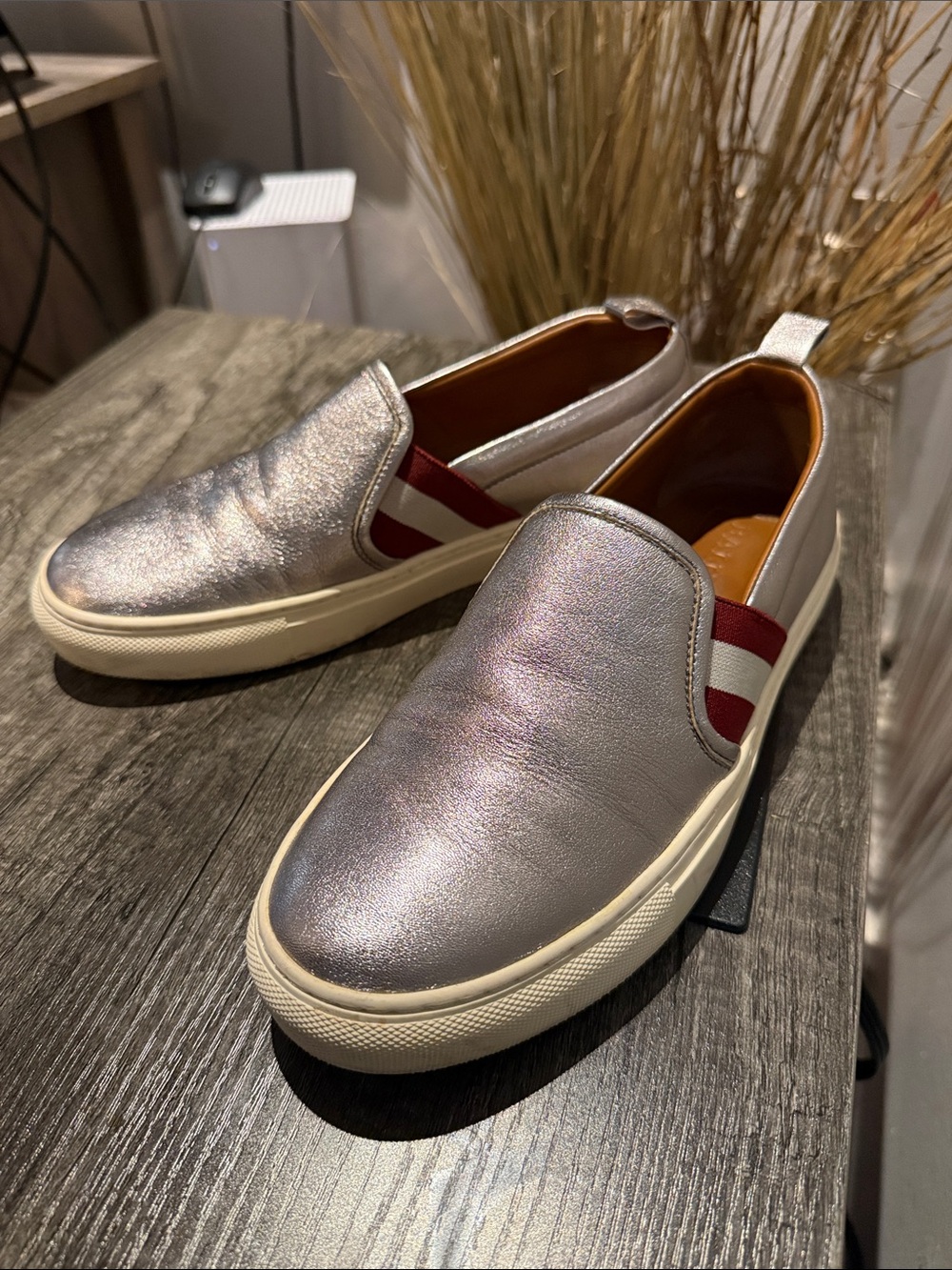Bally Metallic Silver Slip-On Sneakers with Red Stripe Detail